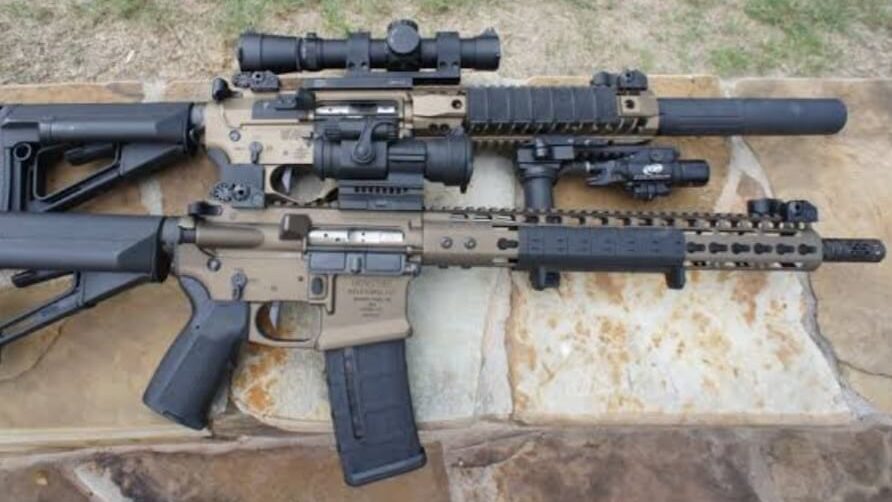 Two customised firearms with various upgrades