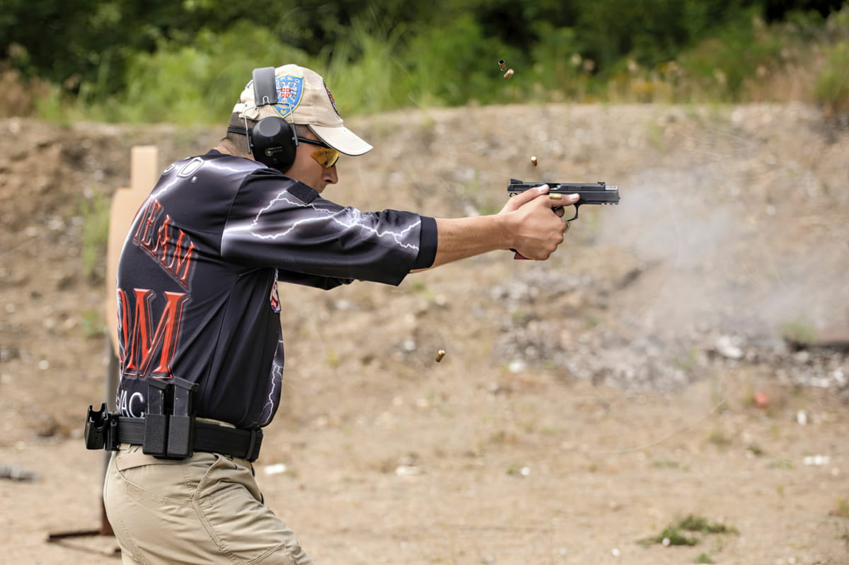 A Man Participating In Competitive Shooting