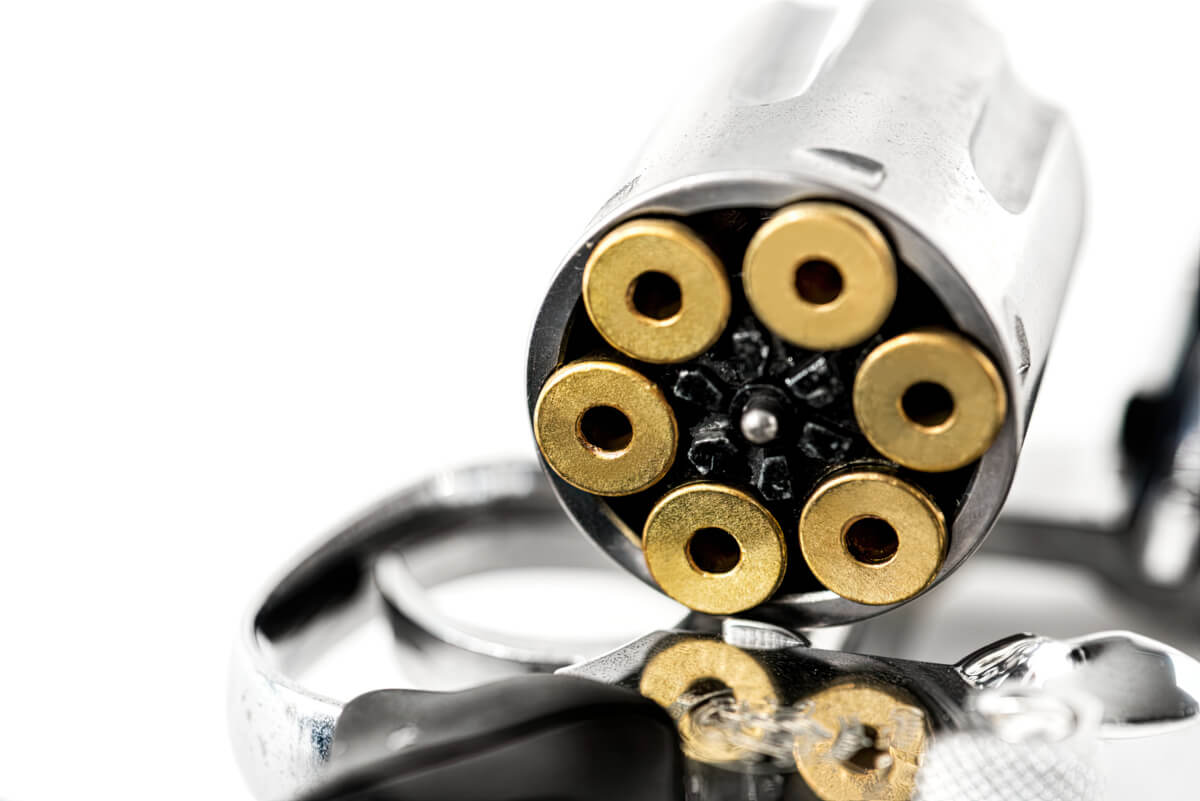 The Back Of An Open Revolver Showing The Ammunition In It